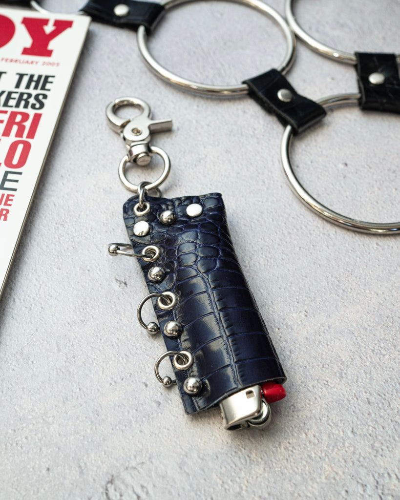 Pierced midnight croc lighter charm